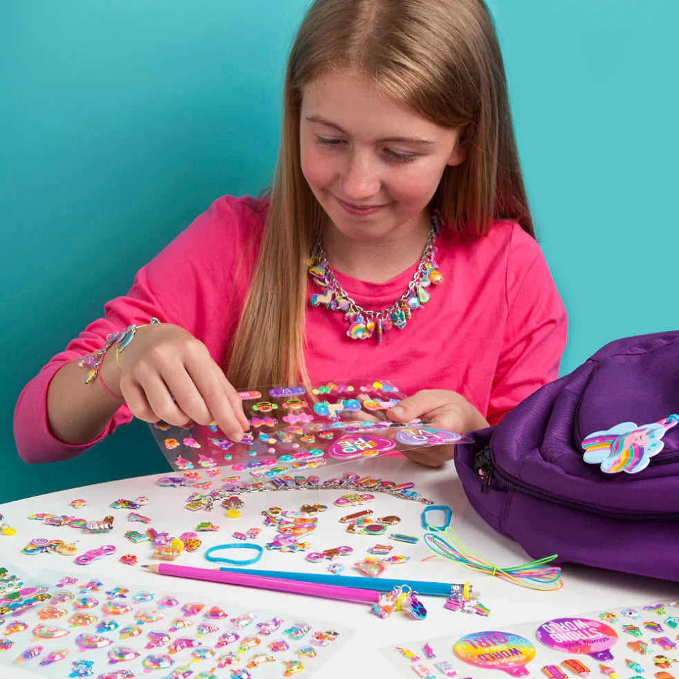 Teen girl players with sticker crafts.