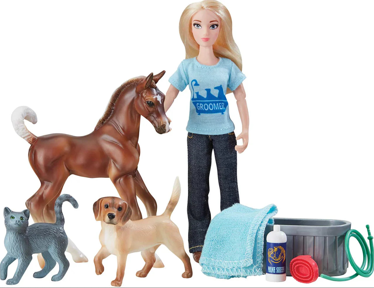 Girl doll with toy horse, dog, and cat.